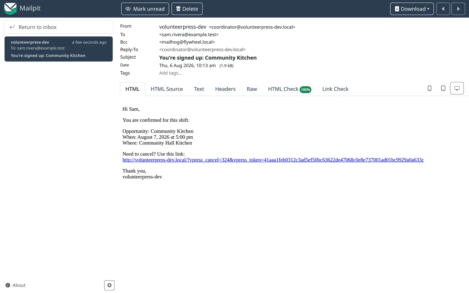 The confirmation email open in an inbox: subject You're signed up: Community Kitchen, a line confirming the shift, the opportunity name, date, time, and location, and a cancellation link